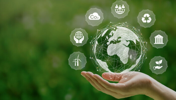 ESG icon concept in the woman hand for environmental, social, and governance by using technology of renewable resources to reduce pollution and carbon emission . in sustainable and ethical business on the Network connection.